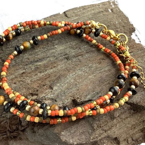 Håndlavet halskæde / armbånd med Onyx, Tigerøje og Toho perler, i Efterårs farver og forgyldt  rustfri stål